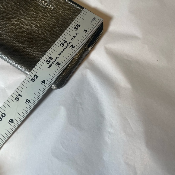 COACH Silver Pewter  Metallic Leather Zipper Wallet Wristlet
$199 
Authentic - Picture 7 of 8